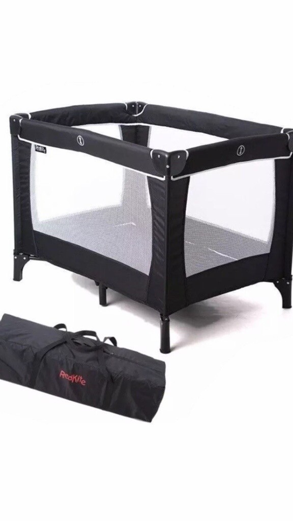 red kite travel cot
